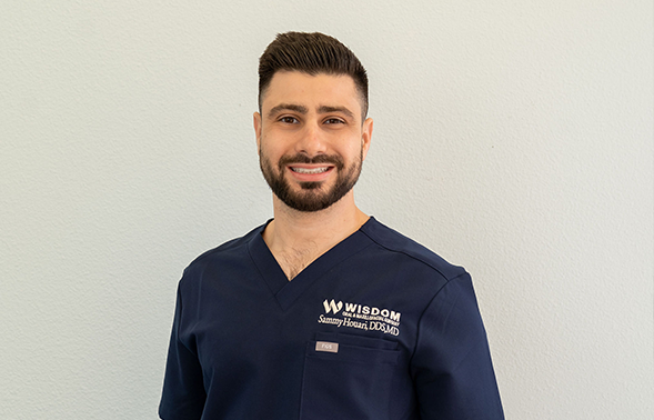 Doctor Houari and Doctor Walker smiling in the office