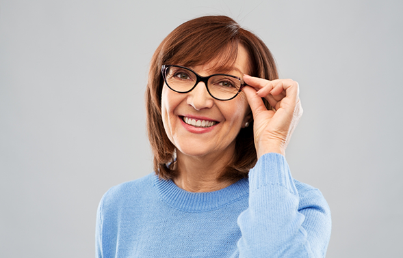 Smiling older woman in a light blue sweater