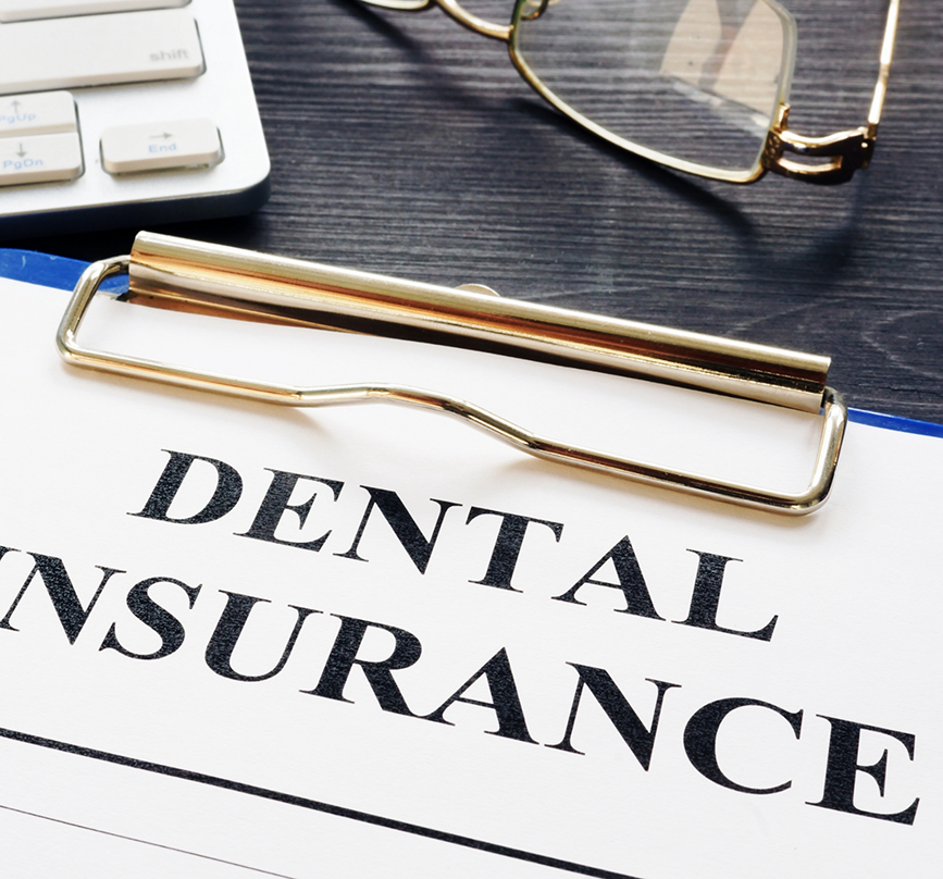Dental insurance form on a clipboard