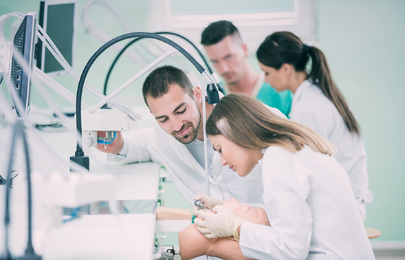 Group of dental professionals at a training facility