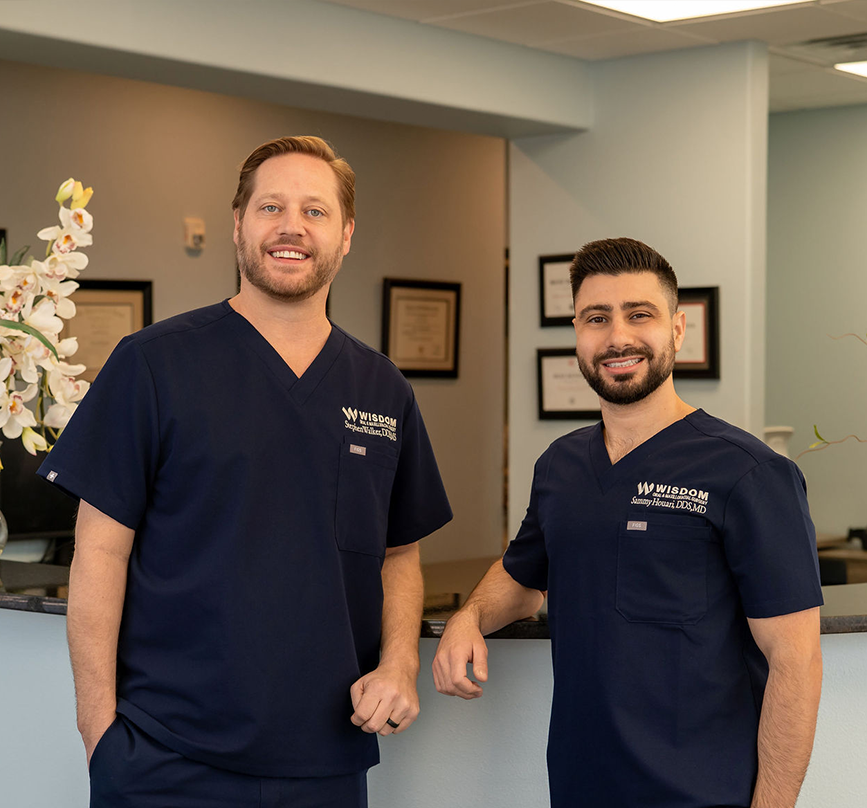 The two dental specialists at Wisdom Oral and Maxillofacial Surgery