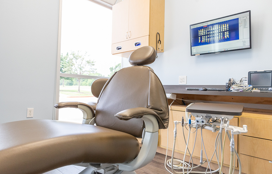 Dental treatment chair and technology at Wisdom Oral and Maxillofacial Surgery office in Prosper