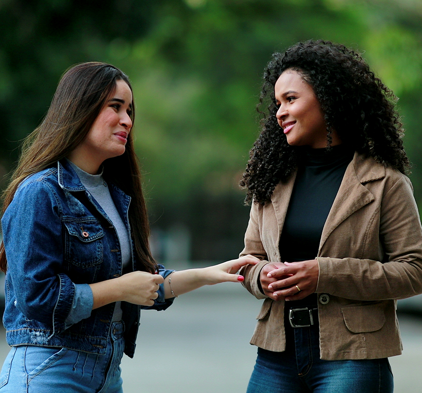 Two women talking outdoors